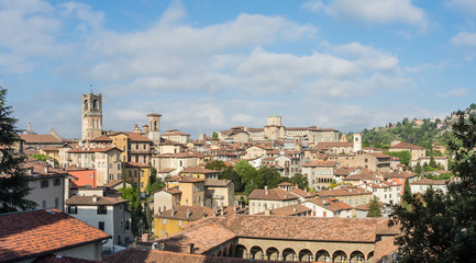 Fototapeta na wymiar Bergamo - Old city (Città Alta), Italy. Landscape on the city center, the old towers and the clock towers from the old fortress