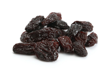 Dried raisins on a white background