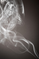 Smoke flows from an aromatic stick