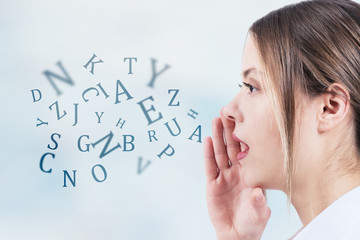 Woman talking with alphabet letters coming out of her mouth