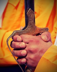 sword on hands during the cerimonial sikh event