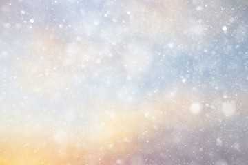 Snowfall texture of snowflakes on blurred background