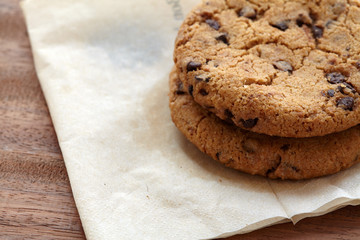 Chocolate chips cookies on the wooden table. quick and easy meal in the morning. Close up shot.