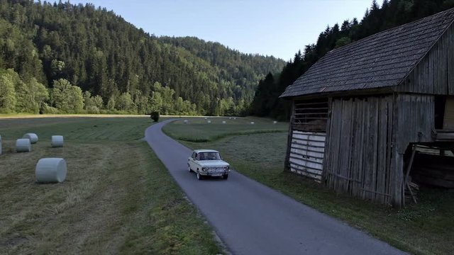 A car is moving on the road in a rural area - 6