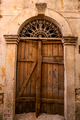 Fototapeta na wymiar Old gate in the ancient town in Montenegro.