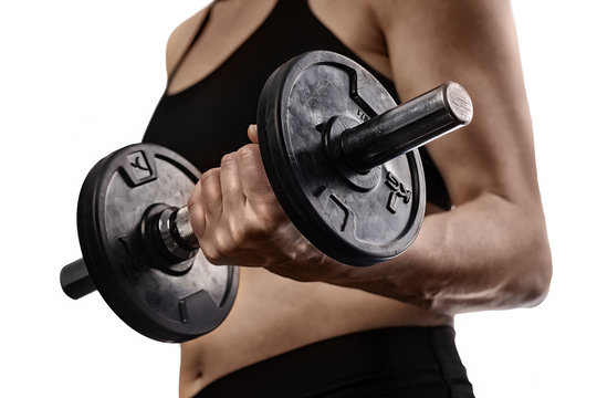 strong woman exercising with a dumbbell
