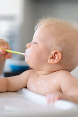 Feeding baby with spoon