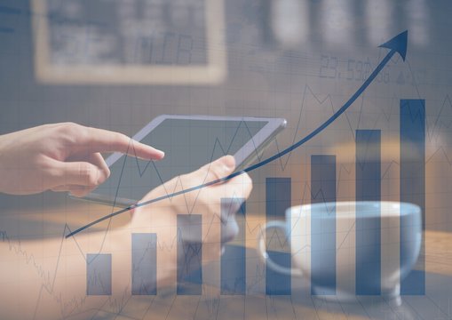 Hands with tablet in cafe and blue graph overlay - Powered by Adobe