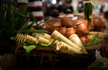 Bamboo glass and A glass of clay pottery in Thai Lanna style