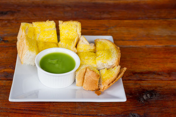 Sliced toast bread with butter and sugar