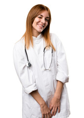 Fototapeta premium Young doctor woman winking