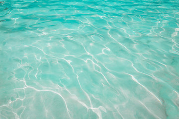 Sea water texture, motion blur background at similan beach.
