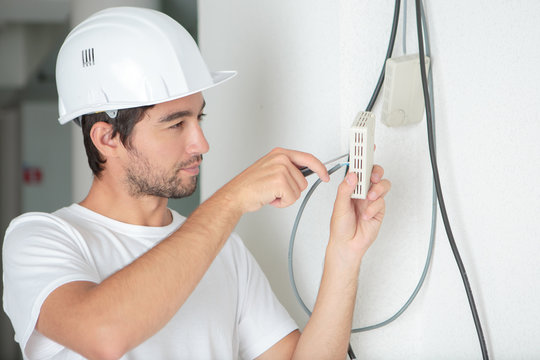 electrician installing a socket