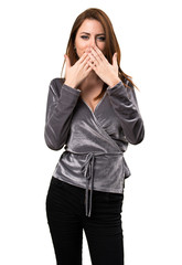 Beautiful young girl covering her mouth