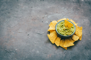 Bowl of guacamole with tortilla chips