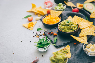 Bowl of guacamole with fresh ingredients
