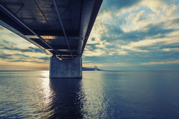 The bridge between Copenhagen Denmark and Malmo Sweden, Oresundsbro, sunset in the summer evening