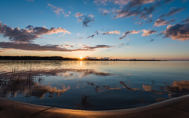 dramatic sunrise over the calm river
