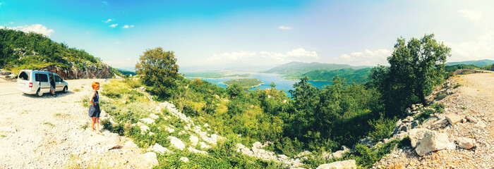 Young hipster friends on road trip on a summers day. Euro-trip