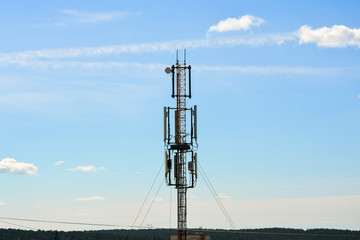 Cell phone tower, Wifi tower, Telecommunication tower in blue sky background.