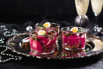 Traditional russian salad dressed herring