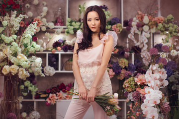 Asian woman with bouquet of flowers