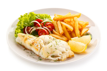 Fried fish fillet with french fries on white background