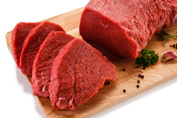 Fresh raw beef steaks on white background