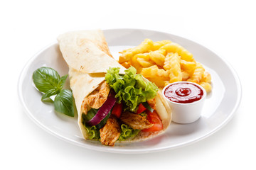 Tortilla wrap with french fries on white background