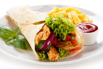 Tortilla wrap with french fries on white background