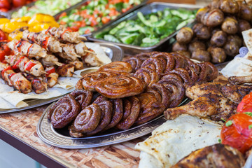 Grilled sausages and shish kebab