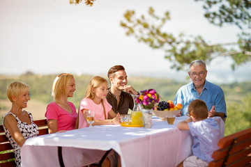 Family enjoying on picnic.