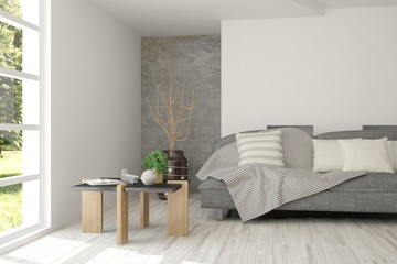 White room with sofa and green landscape in window. Scandinavian interior design. 3D illustration