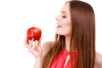 Woman charming girl colorful makeup holds apple fruit