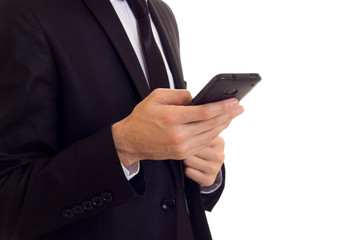 Young man in suit talking on the phone