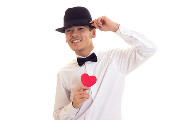 Young man holding a read heart 