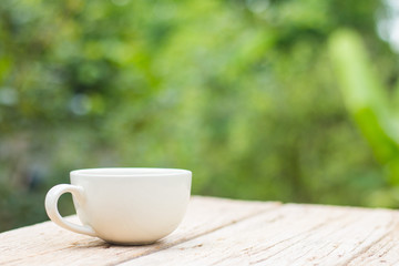 A cup of coffee on a wooden