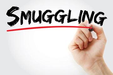 Hand writing Smuggling with marker, concept background