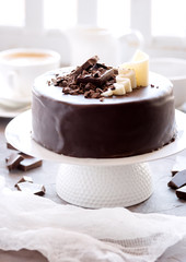 Chocolate cake with chocolate sauce Vertical photo