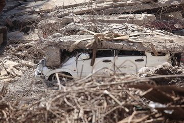 Cars under the rubble for an earthquake in Chile