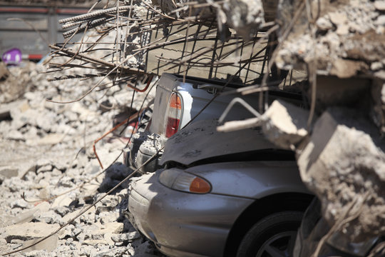 Cars under the rubble for an earthquake in Chile