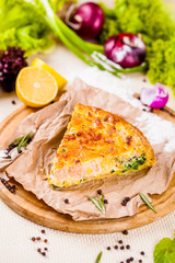 Pie with salmon, potato and herbs