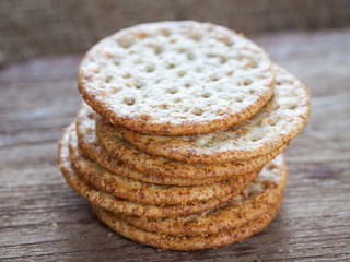 Round shape rice crackers on wooden background