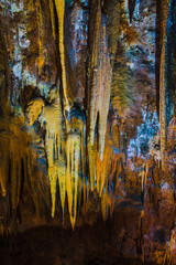 Stalactites and stalagmites in the cave. Portugal