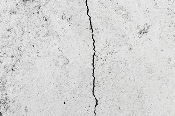 Grungy wall with large crack cement floor texture,cement large crack for background