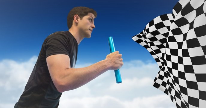 Relay runner against clouds and blue sky and checkered flag
