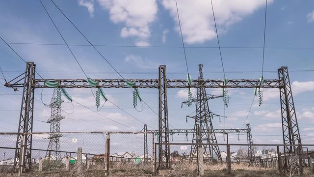 Electrical engineering structures at a power plant. High-voltage wires on supports. power lines. Distribution and transportation of electricity.