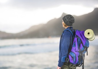 mountain travel, blue jumper men looking to the horizon