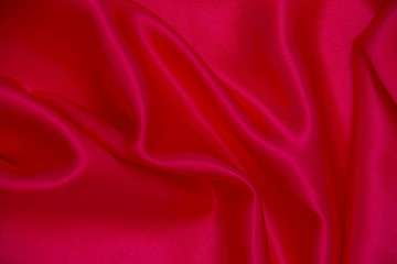 Plakat Red cloth waves background texture.