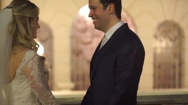 Bride and Groom Looking To Each Other - Love Concept